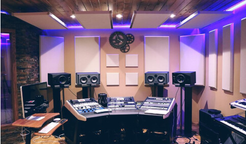 An audio recording room with equipments